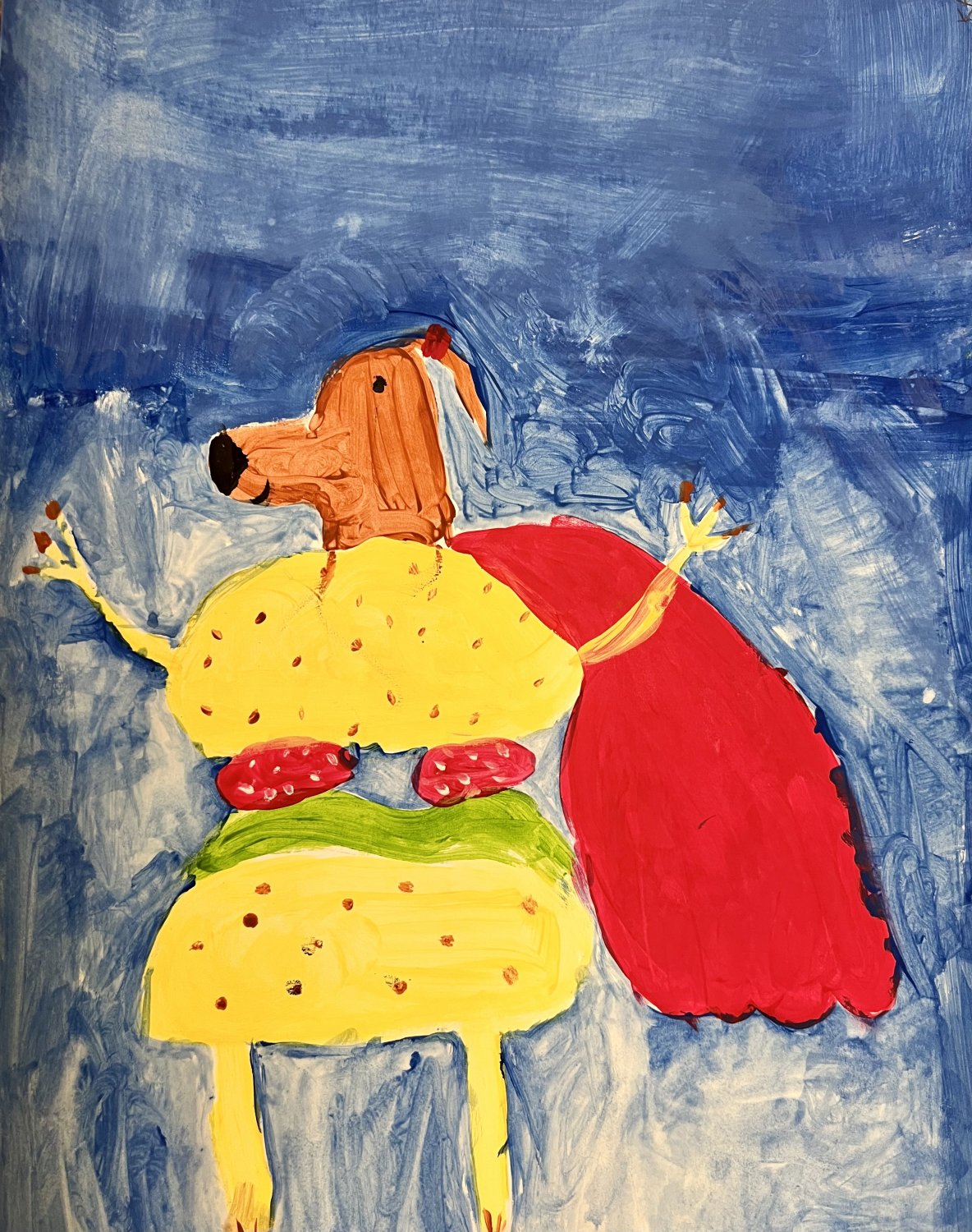 Przyjazny super pies w kształcie hamburgera pilnuje, żeby żadne dziecko na świecie nie było głodne.